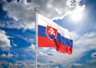Realistic flag. 3D illustration. Colored waving flag of Slovakia on sunny blue sky background.