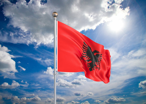 Realistic flag. 3D illustration. Colored waving flag of Albania on sunny blue sky background.