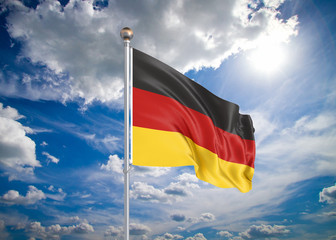 Realistic flag. 3D illustration. Colored waving flag of Germany on sunny blue sky background.