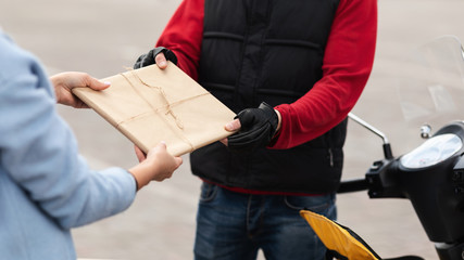 Courier Man Giving Document Package To Customer Outdoors, Closeup