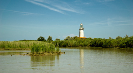 Fototapeta na wymiar Italy, Park of the Po delta, Sacca di Goro, the lighthouse of Goro