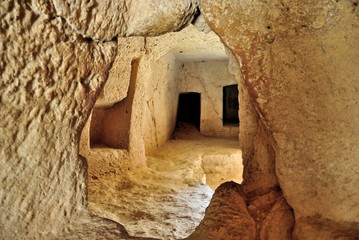 Underground passageway at the ancient Tomb of the Kings necropolis in the city of Paphos (Pafos), Cyprus