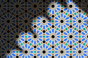 Azulejos of Al Andalus Alcazar of Seville Spain. Play of light and shadow in architecture. Arab pattern decoration