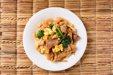 Thai food (Pad See Ew), Stir fried rice noodles soy sauce with pork, Top view
