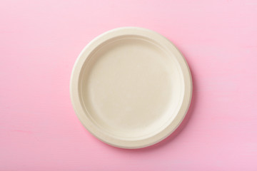 Biodegradable plate, Compostable plate or Eco friendly disposable plate on pink background