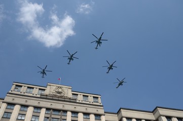Attack combat helicopters Mi-35M in the skies over Moscow during the dress rehearsal of the parade...