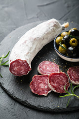 Salami with olives and fresh rosemary