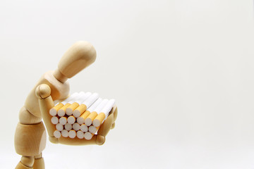 Illustration of a mannequin heavily carrying an armful of cigarettes.on white background. World no tobacco day in may. The concept to quit Smoking. Harm to health from Smoking. Copyspace