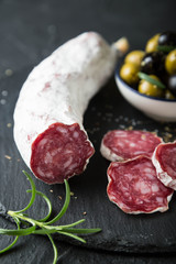 Salami with olives and fresh rosemary