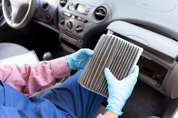 Replacement of dirty cabin pollen air filter for a car
