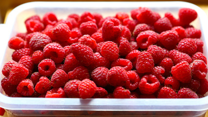raspberry
Fresh ripe raspberries, macro photo of raspberry food. Background texture of ripe pink raspberries, close up on an old wooden table. Picture of a raspberry food product