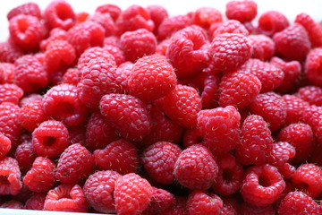 raspberry
Fresh ripe raspberries, macro photo of raspberry food. Background texture of ripe pink raspberries, close up on an old wooden table. Picture of a raspberry food product