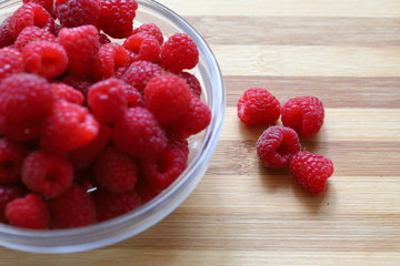 raspberry
Fresh ripe raspberries, macro photo of raspberry food. Background texture of ripe pink raspberries, close up on an old wooden table. Picture of a raspberry food product