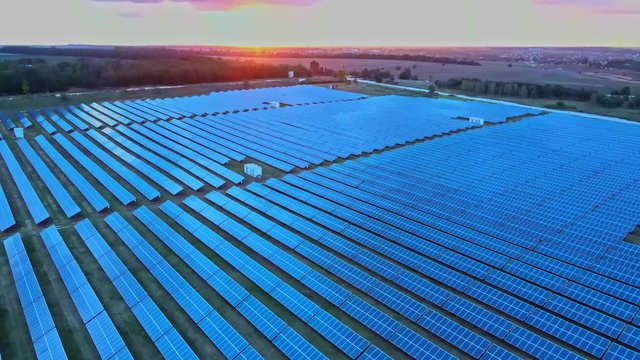 Sunset above photovoltaic central