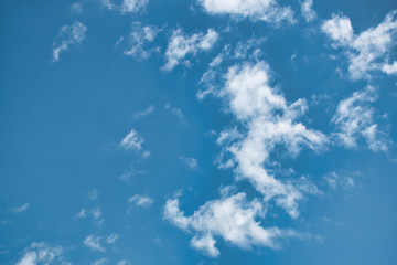 Fototapeta premium Beautiful blue sky with with light puffy cirrus clouds background