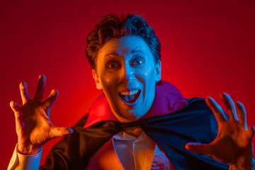 Young man in Dracula costume