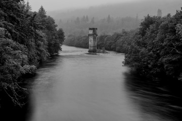 fort Augustus old bridge tower in black and white, located near inverness, scotland.