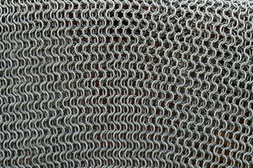 Texture of antique chain mail. Ornament, armour. Close-up