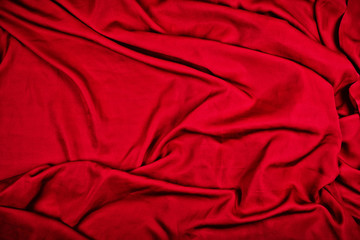 Dramatic closeup folds of wine-red or red drapery (with copyspace for text)