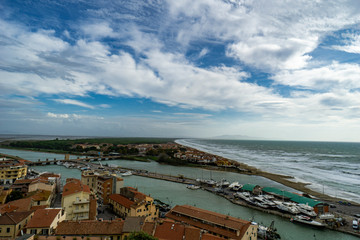 Italy Tuscany Maremma Castiglione della Pescaia, period of flood, panoramic view of the coast of the port entrance