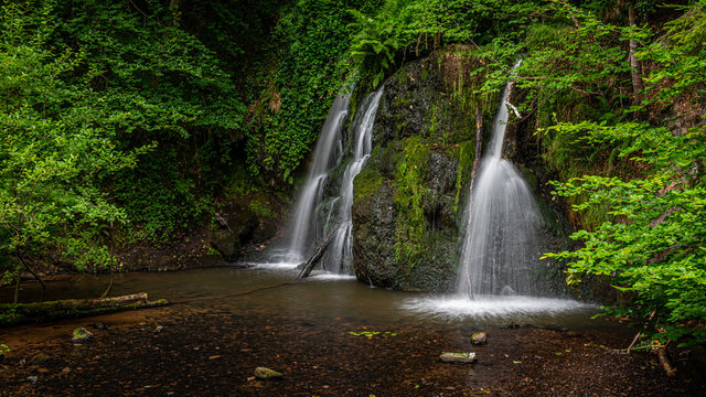 Top Falls at Fairy Glen Nature Reserve. A popular woodland walk with two delightful waterfalls, close to the village of Rosemarkie, in the Scottish Highlands