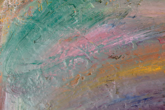 Background image of bright oil-paint palette closeup. © fusssergei