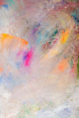 Background image of bright oil-paint palette closeup.