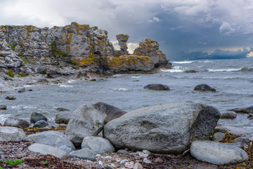 Fototapeta na wymiar Rocks near Baltic sea. Rocky shore in Sweden. Gotland island. Photo of scandinavian nature. North Europe.