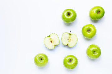 Fresh green apples on  white background.