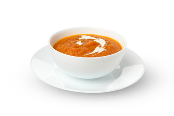 Plate with pumpkin puree and parsley isolated on white background