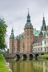 Naklejka premium Frederiksborg Castle (Frederiksborg Slot, XVII century) - palace in Hillerod, Denmark. Castle built as royal residence for King Christian IV of Denmark-Norway, now History Museum. 