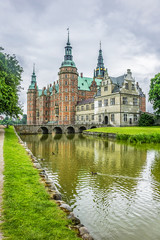 Fototapeta premium Frederiksborg Castle (Frederiksborg Slot, XVII century) - palace in Hillerod, Denmark. Castle built as royal residence for King Christian IV of Denmark-Norway, now History Museum. 