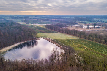 Fototapeta na wymiar Aerial view of small scale Frisian landscape
