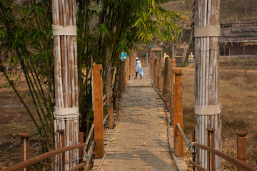 Su Tong Pae bamboo wooden bridge of Wat Phu Sa Ma temple for thai people and foreign traveler travel visit while PM 2.5 Dust situation in Ban Kung Mai Sak village at Pai city of Mae Hong Son, Thailand