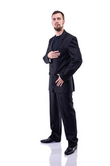 Obraz na płótnie Canvas Bearded man in a business suit on a white background.