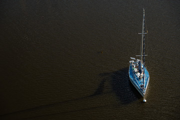 An isolated sailboat on the water