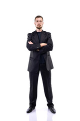 Bearded man in a business suit on a white background.