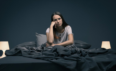 Stressed woman suffering from insomnia - obrazy, fototapety, plakaty