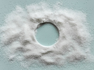 Round white sugar frame. Sweet background. Copy space. Top view