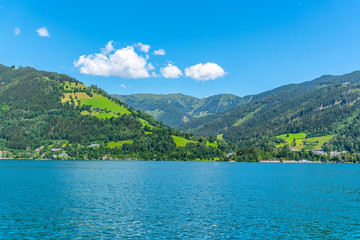 Fototapeta na wymiar Lake Zell, German: Zeller See, and mountains on the backround. Zell am See, Austrian Alps, Austria