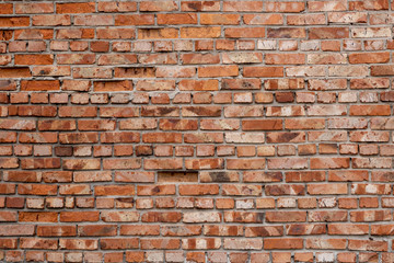 Wall of red bricks. Texture or background of bricks.