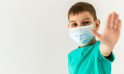 Child in mask outstretched hand stop covid