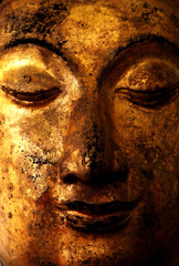 Face of gold buddha close up background with texture.   