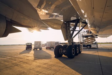 Loading of cargo containers to airplane