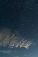 Lighthouse in the sunset and the moon rise