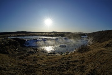 sunset over the waterfall