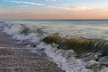 Fototapeta premium Morning sunrise and waves at the beach