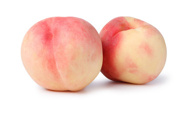 two pink peach isolated on white with peach clipping path