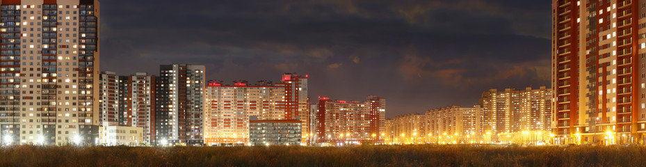Fototapeta na wymiar Wide-format panorama of the modern night city