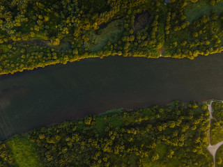 Top Down Drone View Over Dunajec River and Green Forest in Poland
